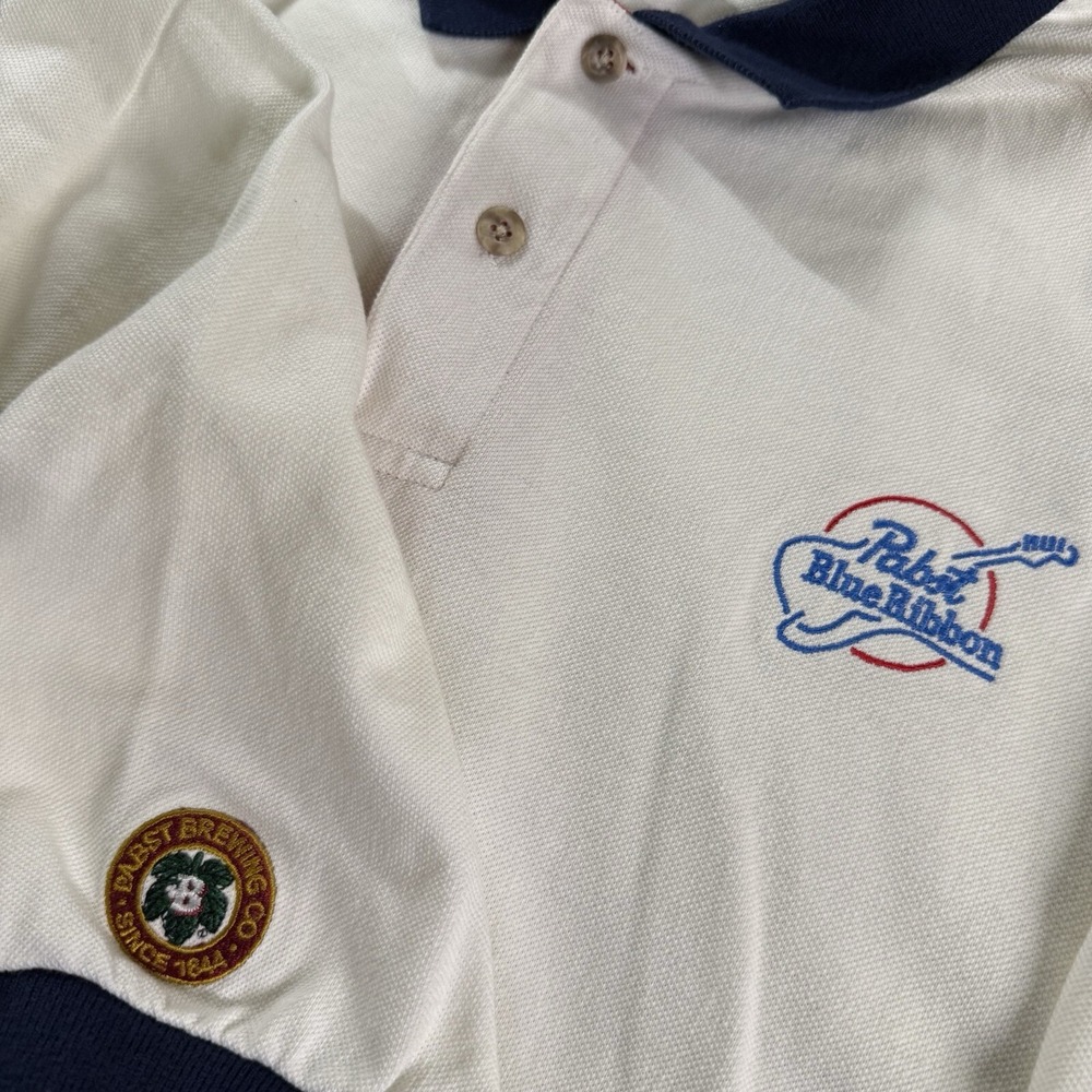 White Polo with Navy Trim